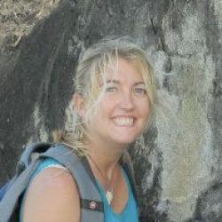 Image of Amanda Lawrence in front of a rock.