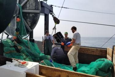 Discussing fishing operations on the F/V Karen Elizabeth.